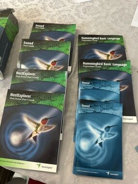 Hummingbird User Guides in Blue and Green Covers